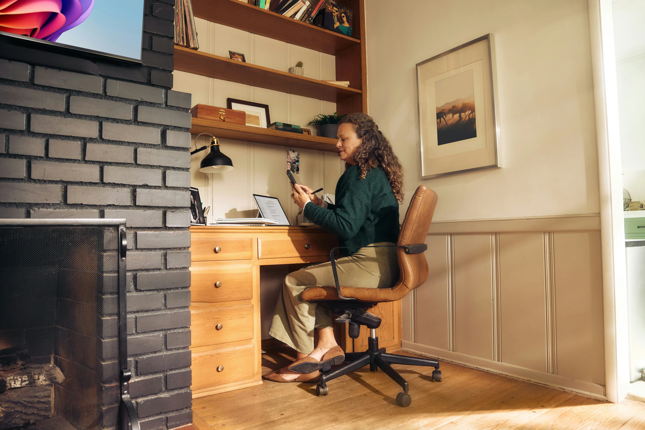 Warm-toned planning dashboard scene with a chart card over a laptop.