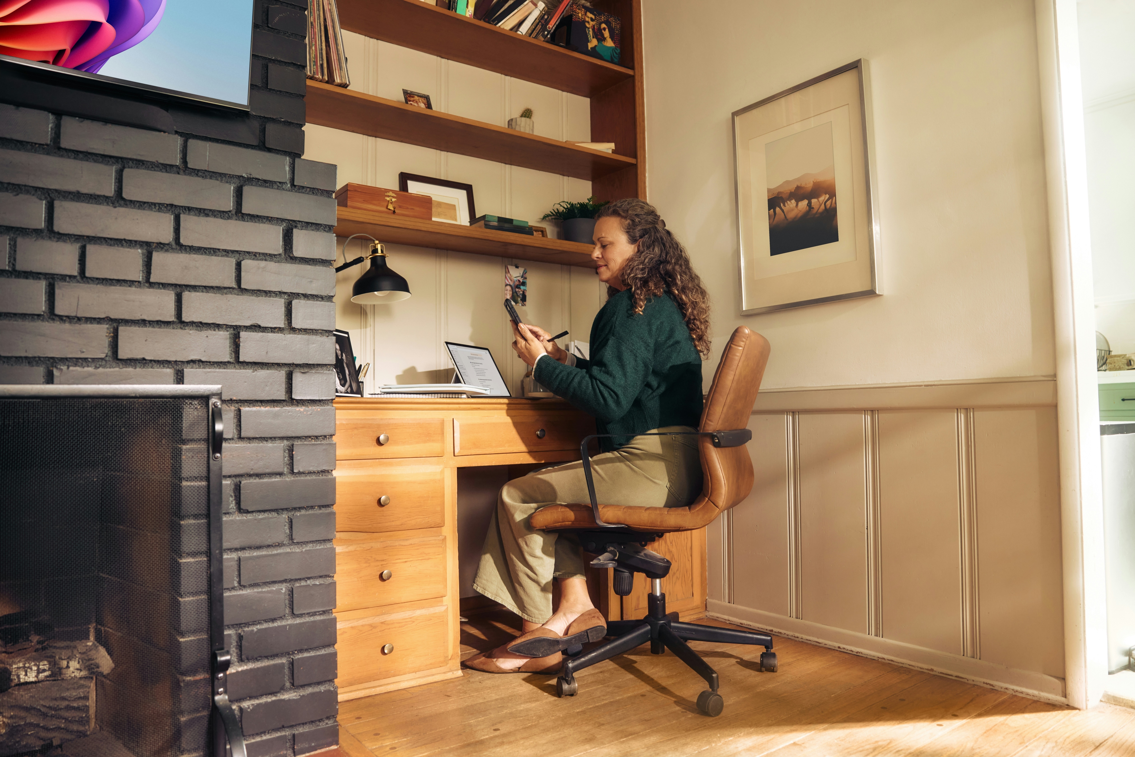 Warm-toned planning dashboard scene with a chart card over a laptop.